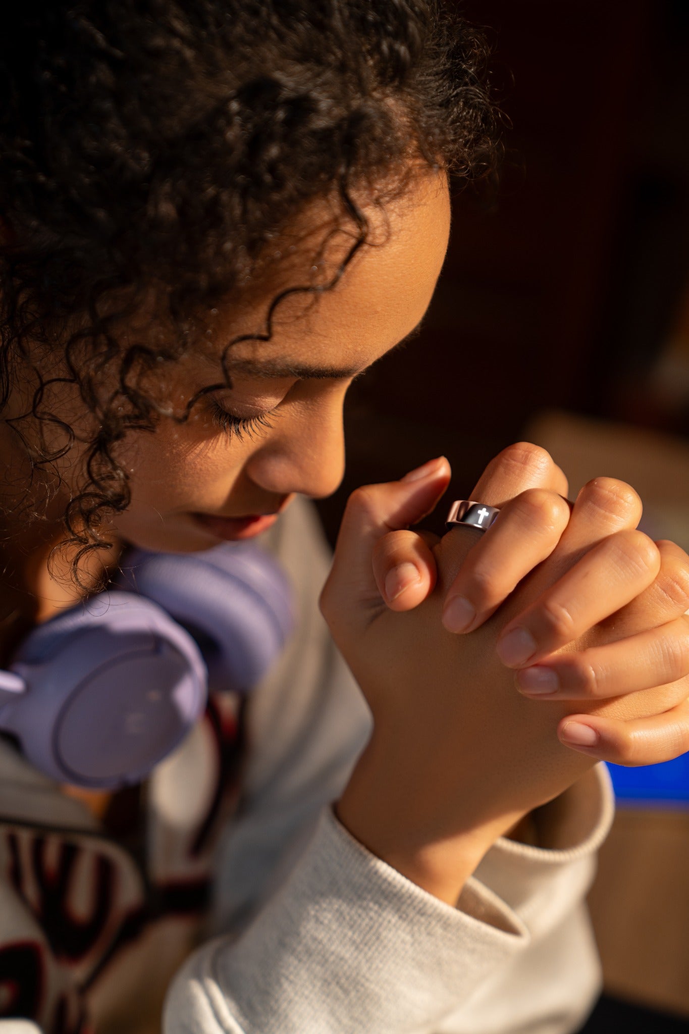 A quiet moment of prayer while wearing Elah Ring