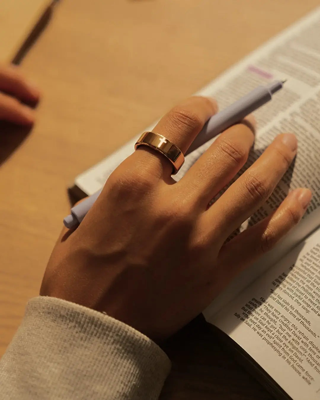 Elah Ring worn beside an open Bible