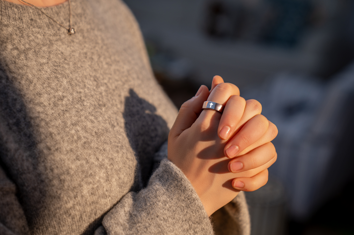 Hands resting quietly while wearing an Elah Ring